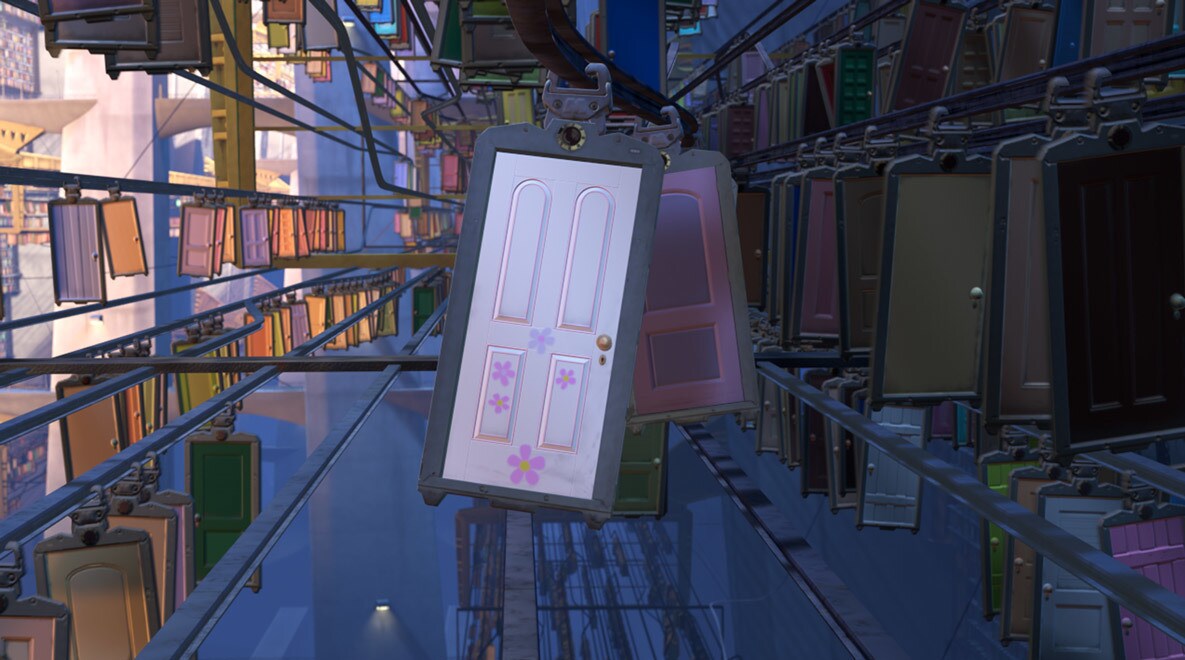 Boo's white door with pink flowers amongst other doors in Monsters, Inc.