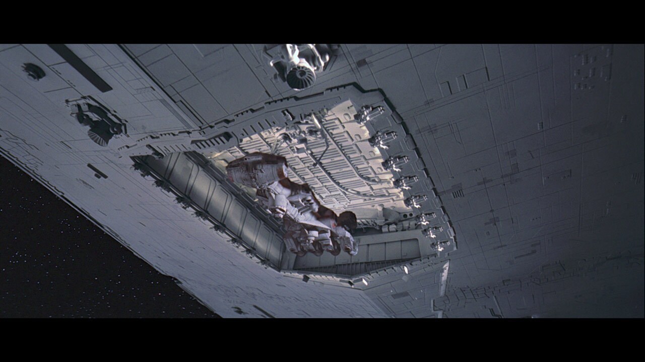 The Alderaan cruiser is drawn into the underside of an Imperial Star Destroyer.