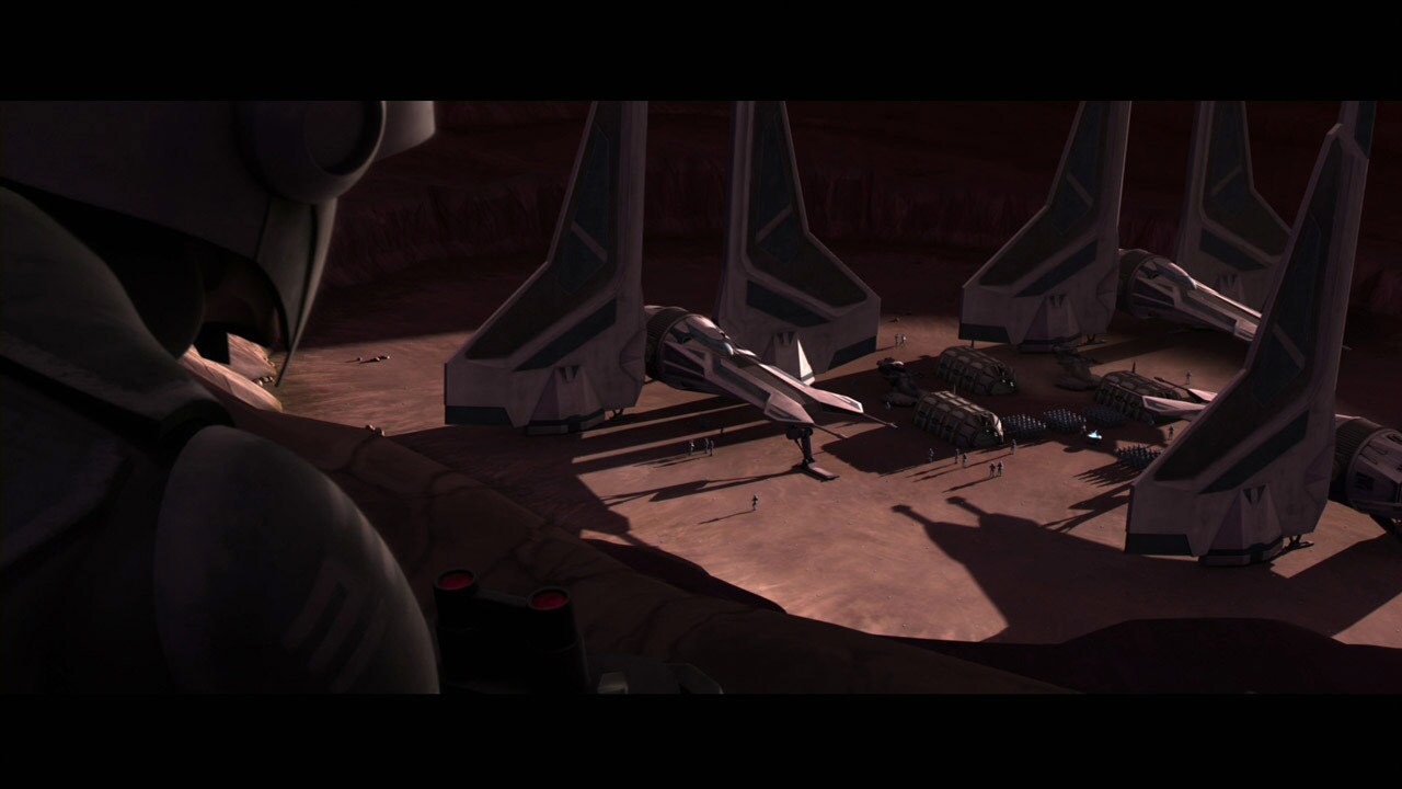 A scout from Mandalore peers into the abandoned mining base that Vizsla has transformed into the ...