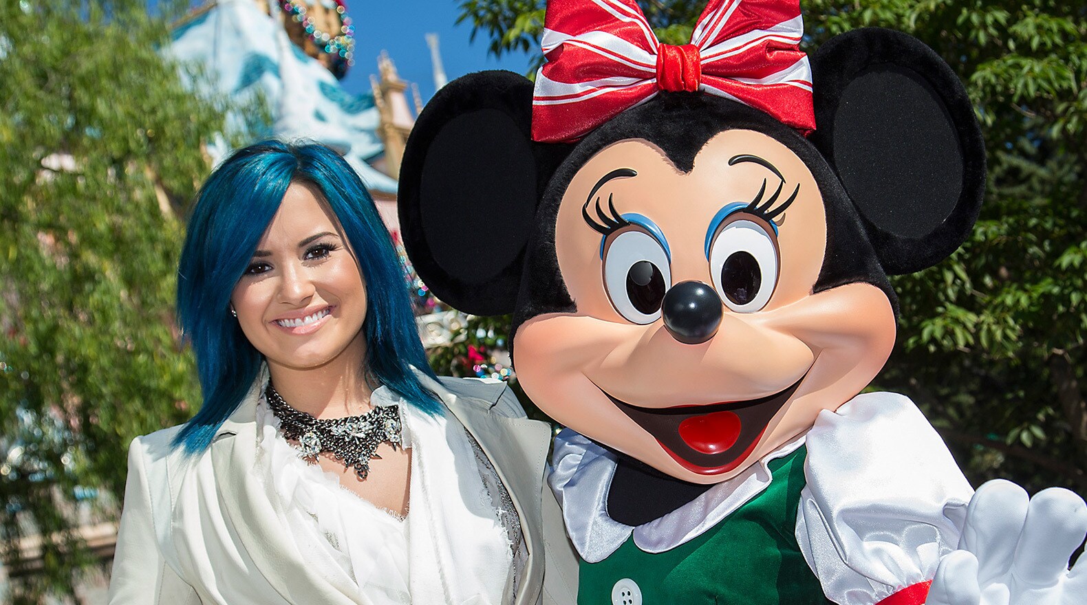 Demi Lovato and Minnie Mouse, appearing in the Disney Parks Christmas Day Parade.