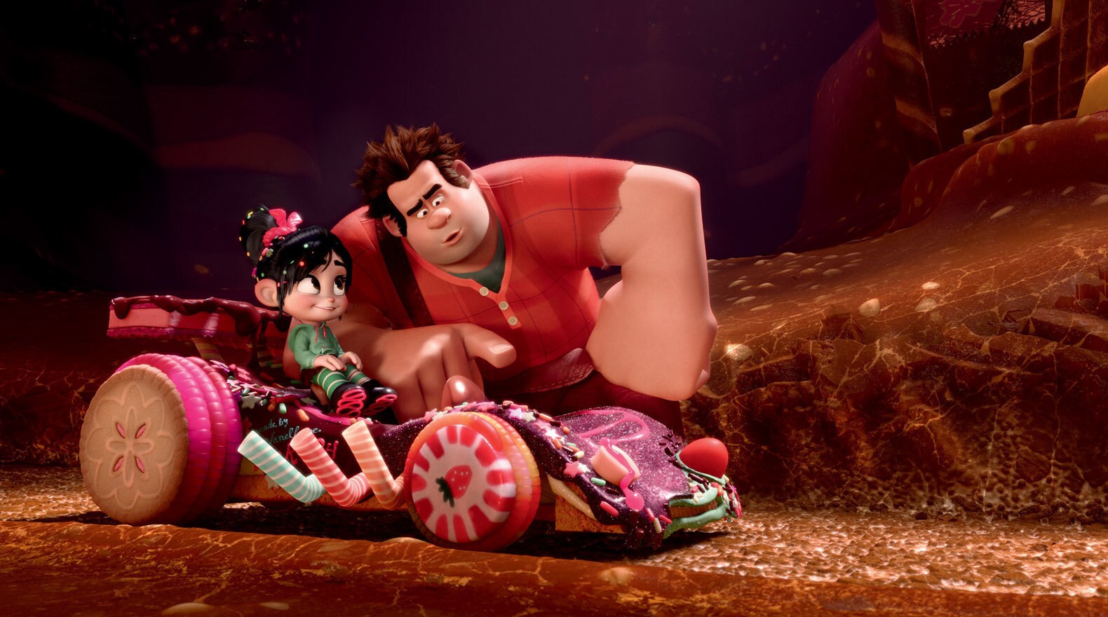 Ralph played by John C. Riley teaching Vanellope played by Sarah Silverman, who is in her candy car, how to drive in "Wreck-It Ralph"