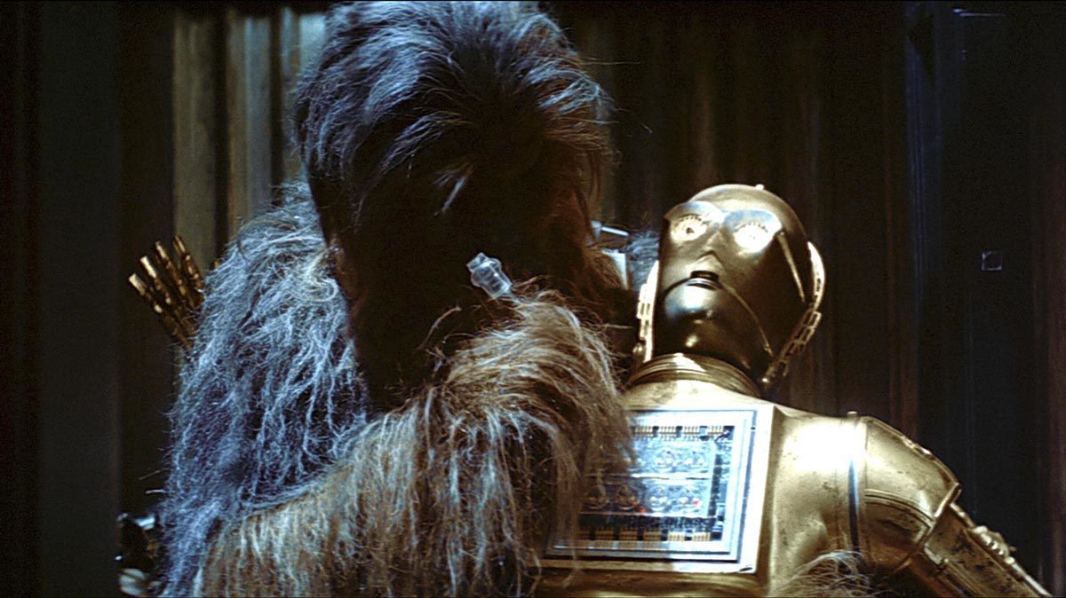 Chewbacca attempting to fix C-3PO in Cloud City