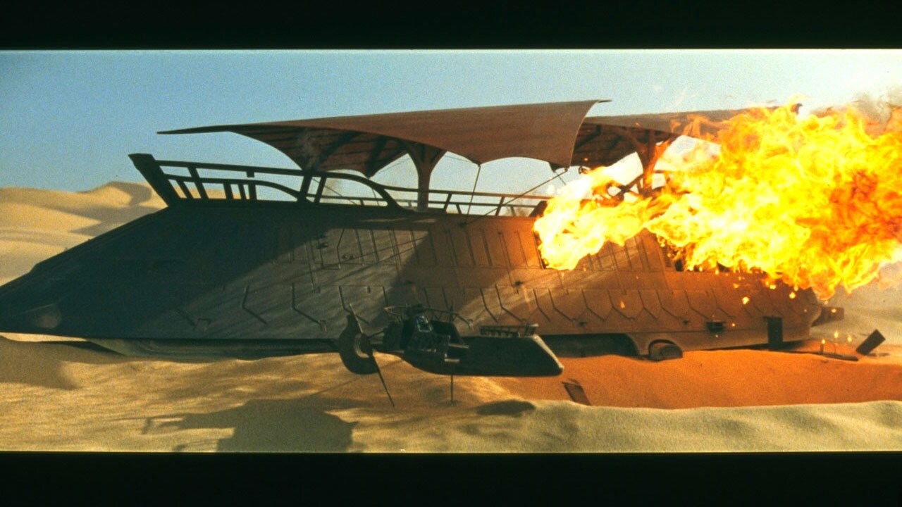 Their captors vanquished, the Rebels race from Jabba's exploding sail barge on a skiff. 