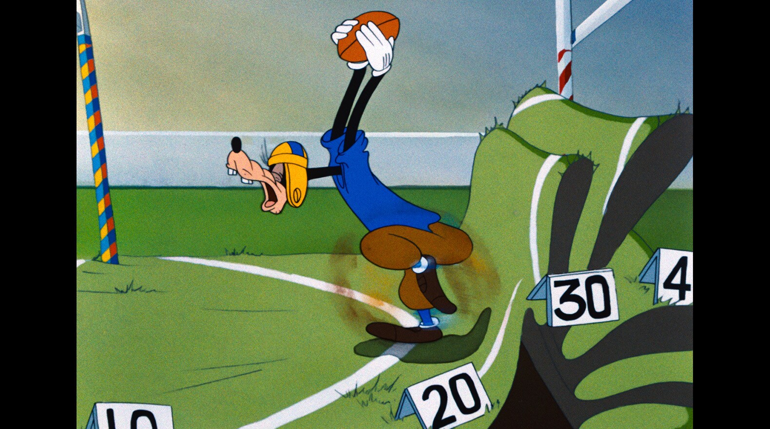 Goofy gets ready to run down the field.