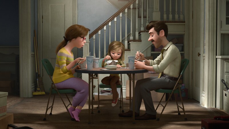 Riley and her parents in their kitchen eating dinner from the movie "Inside Out"