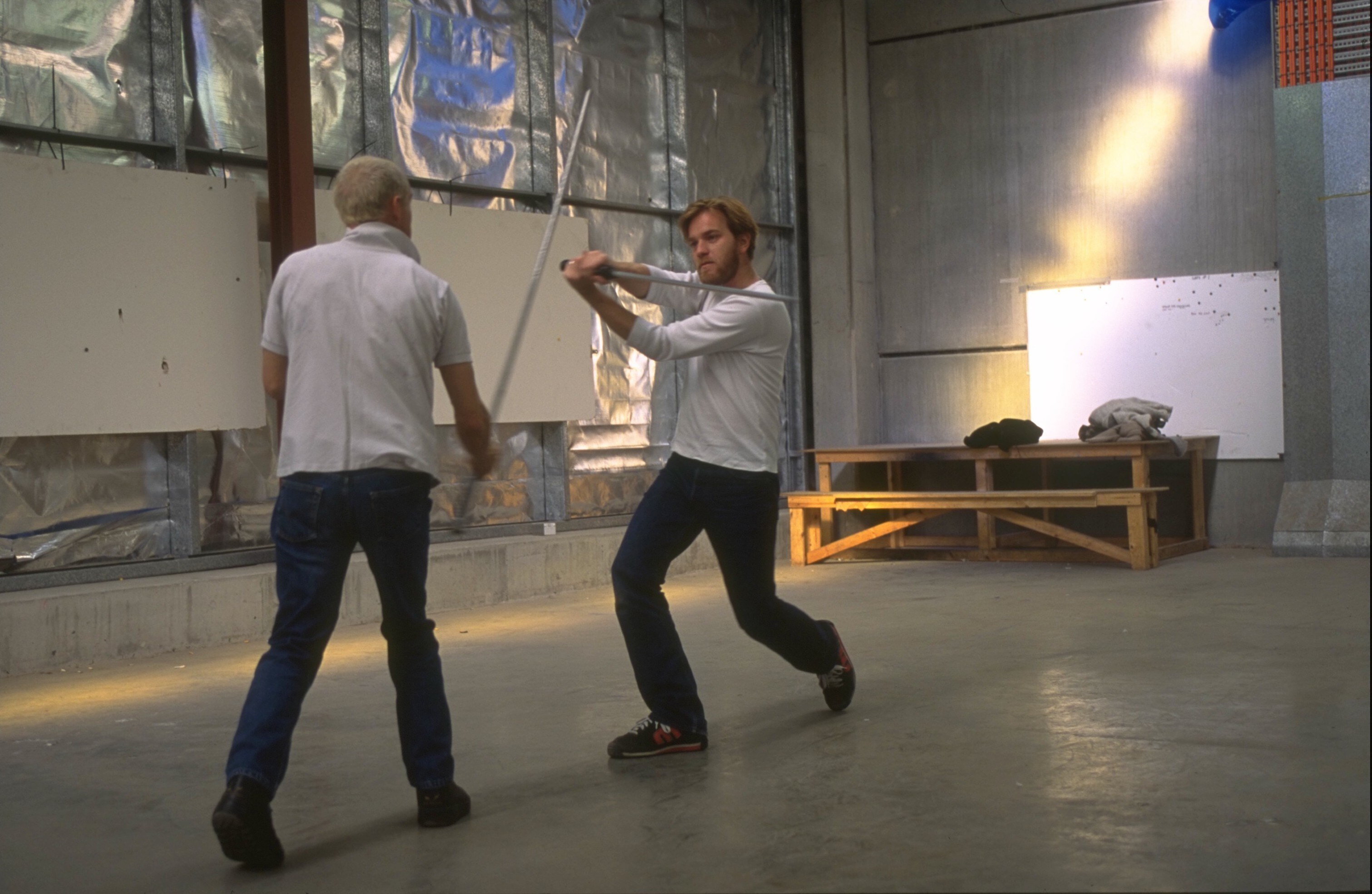 Stunt coordinator Nick Gillard (left) and Ewan McGregor (right) practice lightsaber-duel choreogr...