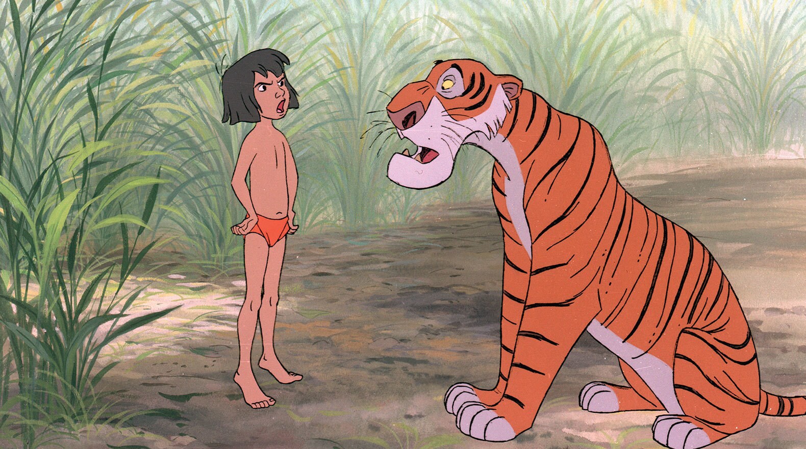 "You don't scare me. I won't run from anyone." Mowgli (voice of Bruce Reitherman) and Shere Khan (voice of George Sanders) from the Disney movie The Jungle Book (1967).