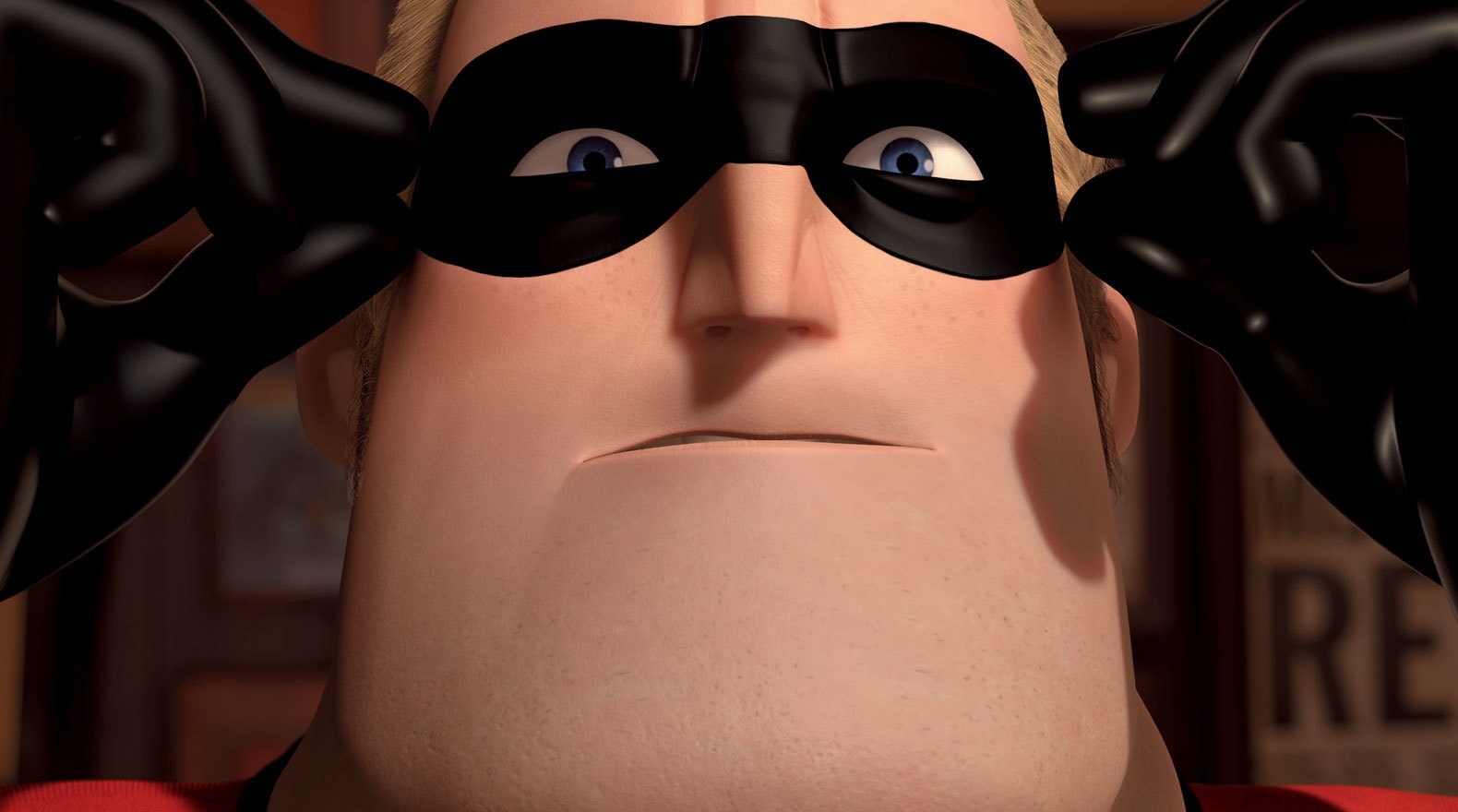 Mr. Incredible puts on his mask in "The Incredibles"