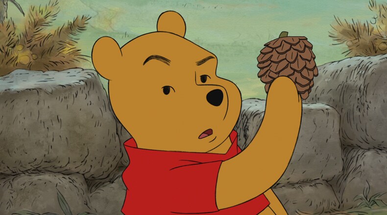 Pooh has questions about this pinecone.