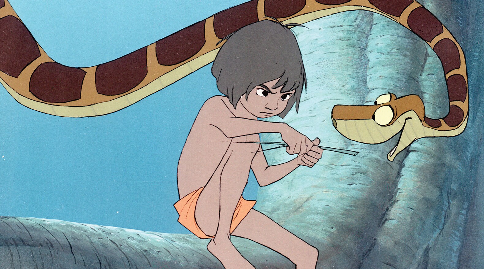 "You told me a lie, Kaa. You said I could trust you!" Mowgli (voice of Bruce Reitherman) and Kaa (voice of Sterling Holloway) from the Disney movie The Jungle Book (1967). 