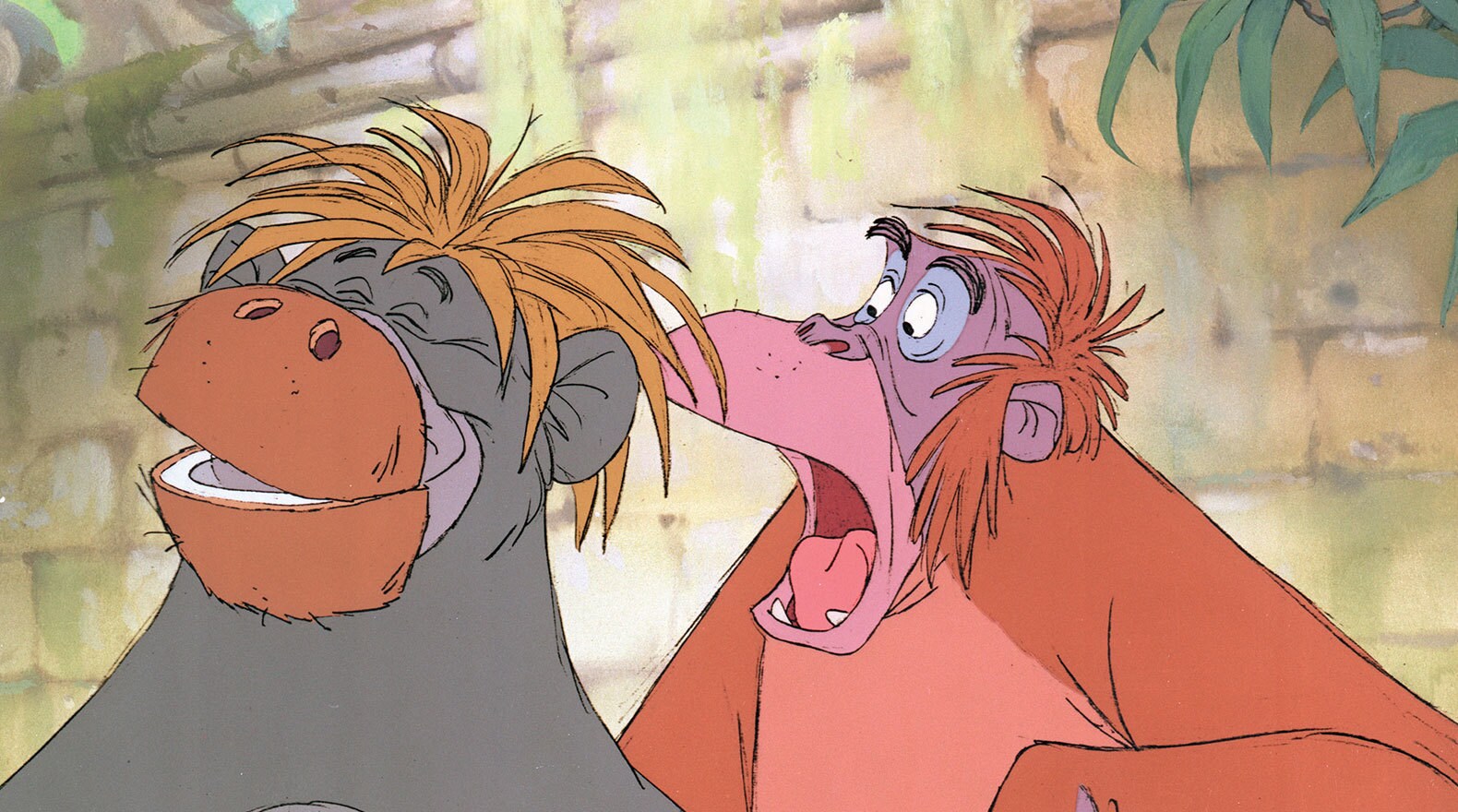 Baloo's cover is blown when his disguise comes apart. Baloo (voice of Phil Harris) and King Louie (voice of Louis Prima) from the Disney movie The Jungle Book (1967).