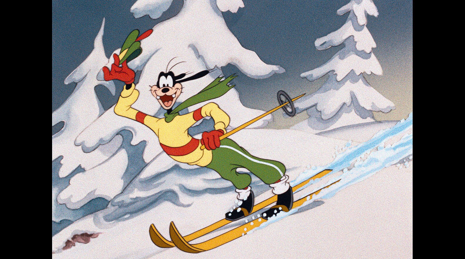 Goofy shows off his skills on the slopes.