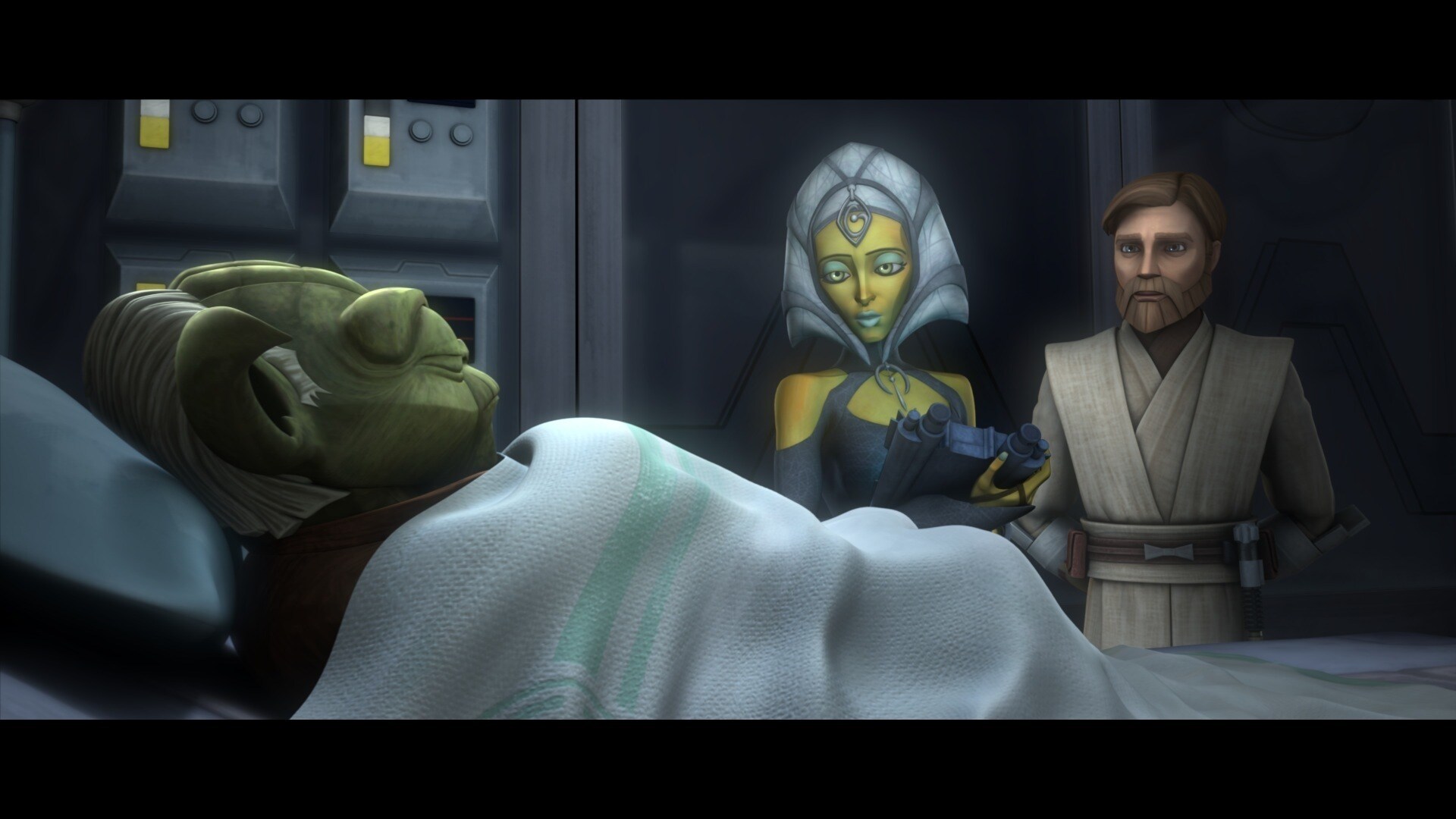 Yoda lies in a bed in the Jedi Temple medical ward, closely examined by sensors. Jedi Doctor Rig ...
