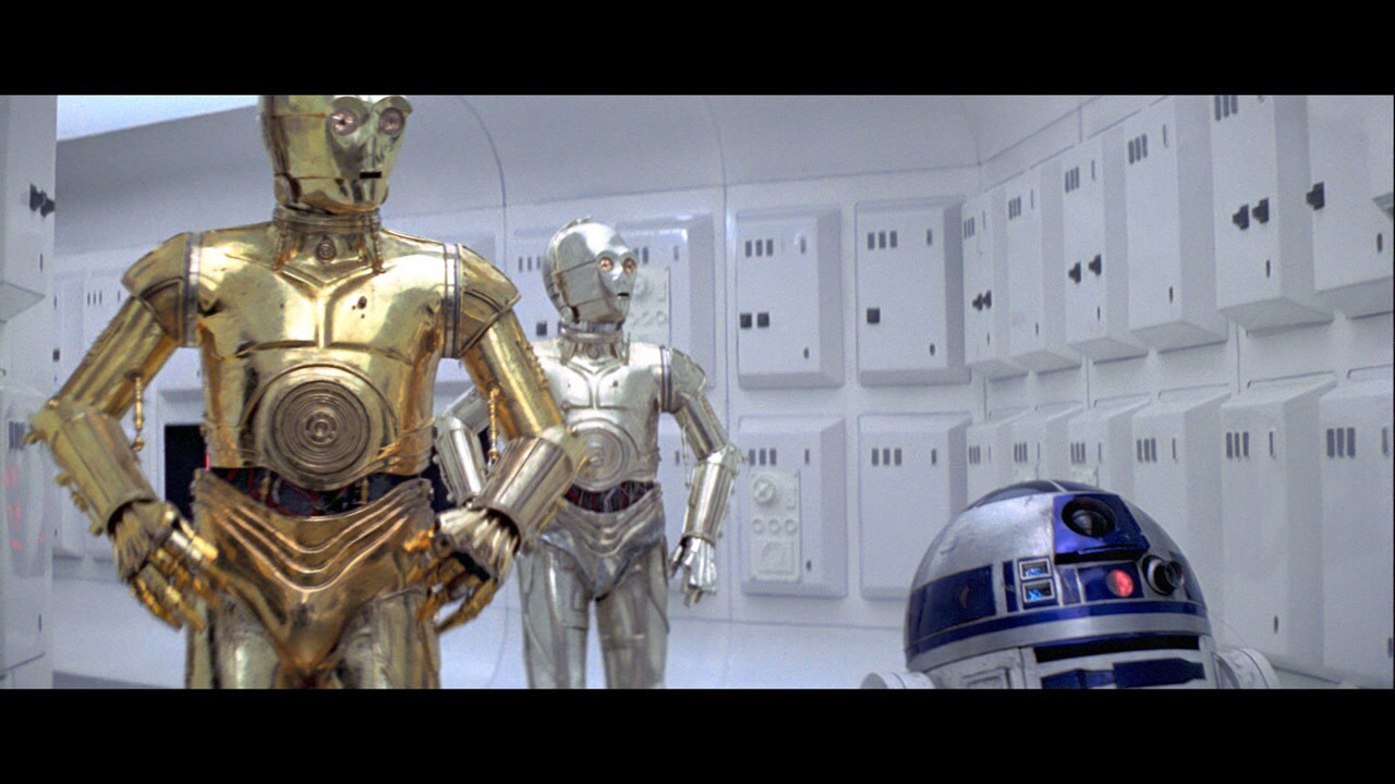 C-3PO and R2-D2 scramble for cover from the impending Imperial boarding party. 