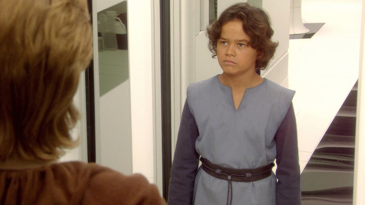 A young Boba Fett greeting Obi-Wan Kenobi