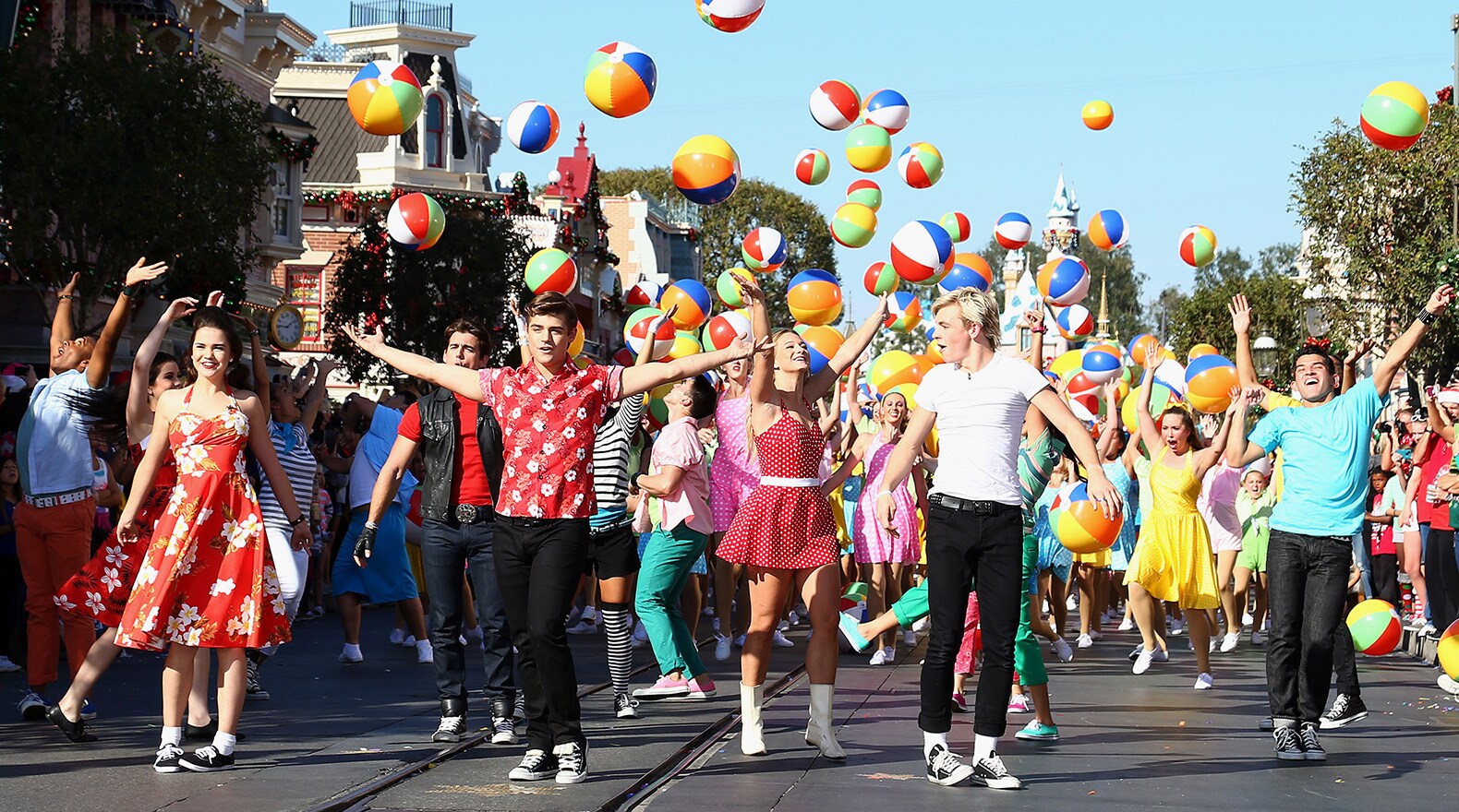 The cast from Disney Channel's original musical, "Teen Beach Movie" performs on Main Street, U.S....
