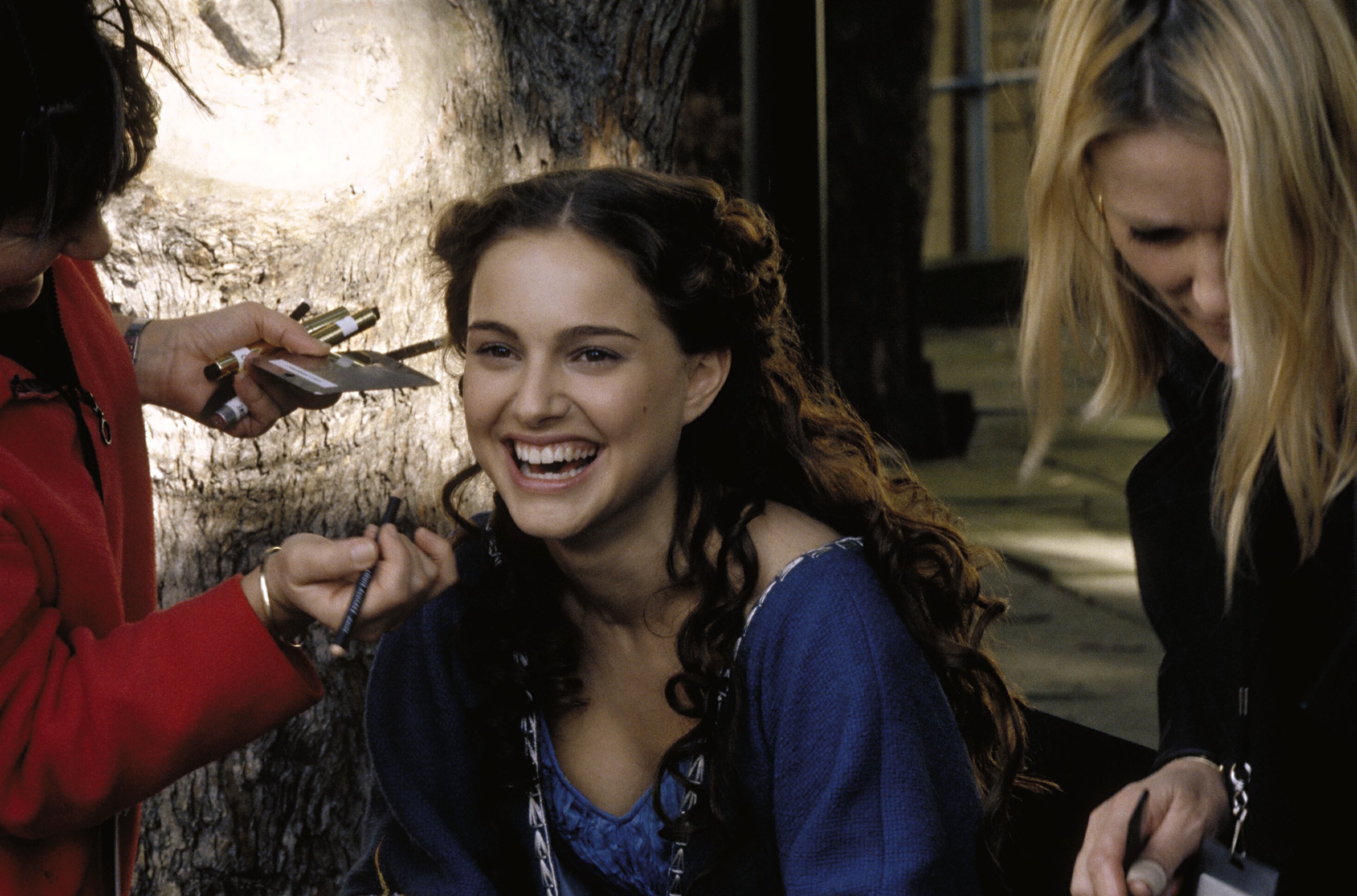 Natalie Portman gets last-minute hair and makeup for a Naboo scene in Como, Italy.  