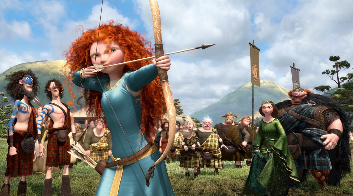 Merida, voiced by Kelly Macdonald, aiming her bow and arrow in the movie Brave. Her mother Elinor, voiced by Emma Thompson, and father Fergus, voiced by Billy Connolly are in the background.