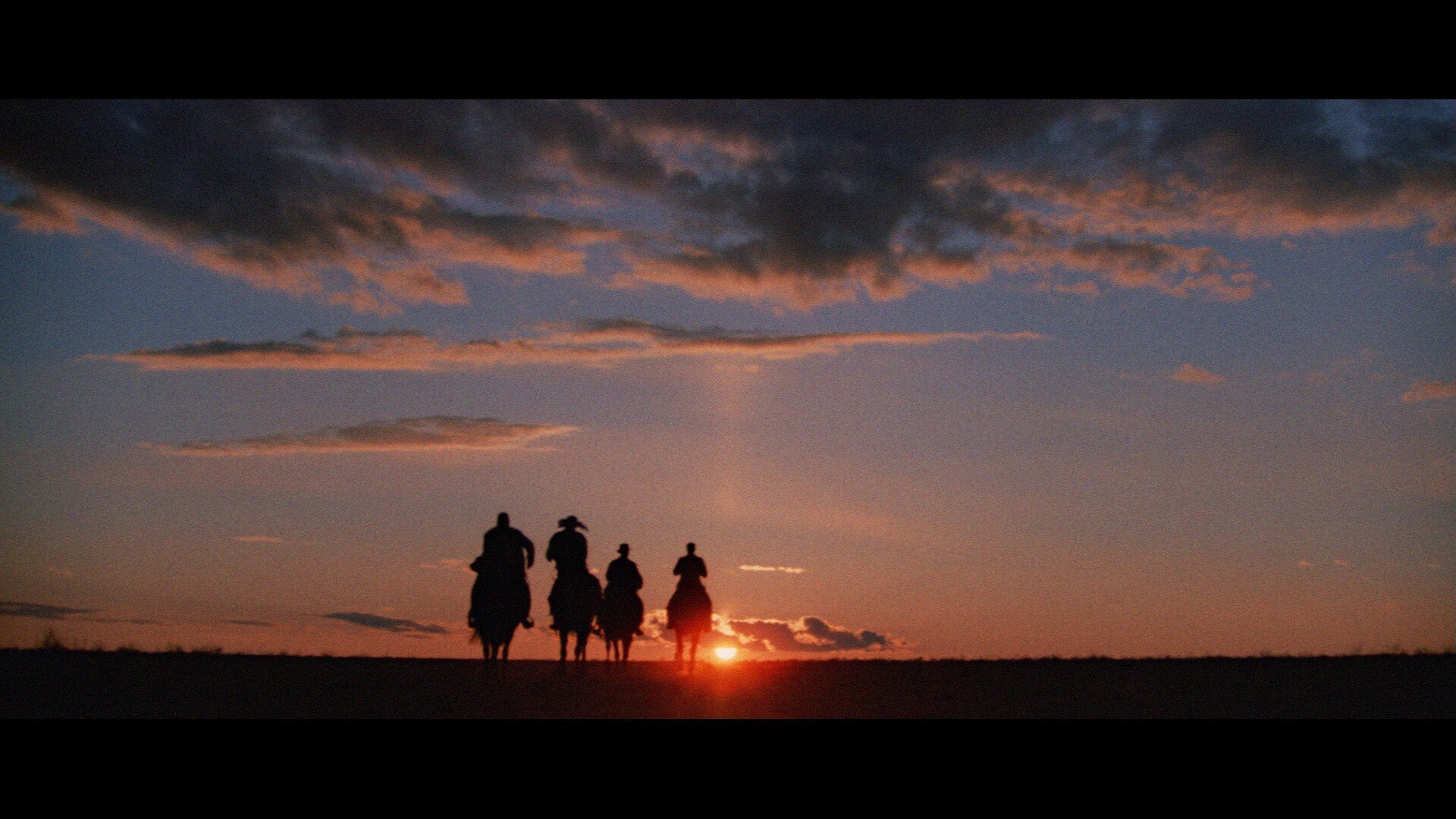 The script specifically says the heroes ride off "like the end of The Last Crusade."