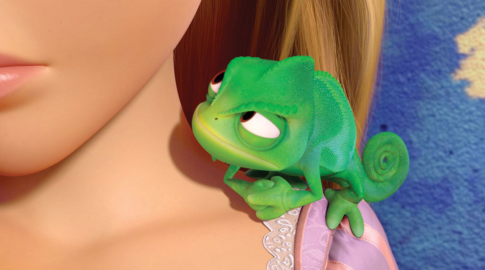 Pascal a chameleon sitting on Rapunzel's shoulder