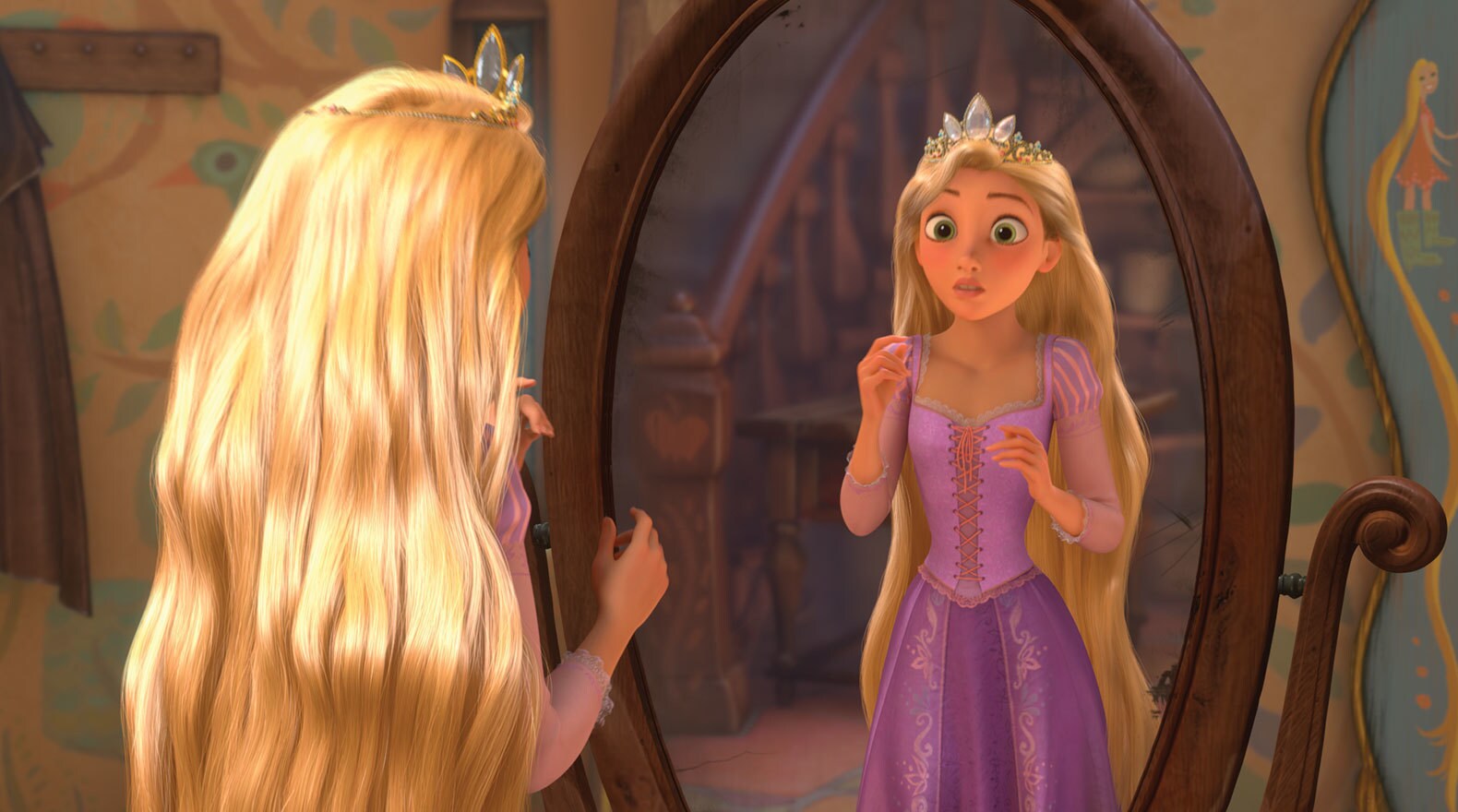 Rapunzel voiced by Mandy Moore wearing a crown and looking into a mirror