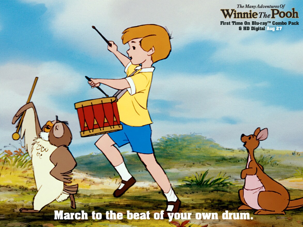 Owl (voiced by Hal Smith), Christopher Robin (voiced by Buce Reitherman), and Kanga (voiced by Barbara Leddy) marching with drums in the movie The Many Adventures Of Winnie The Pooh