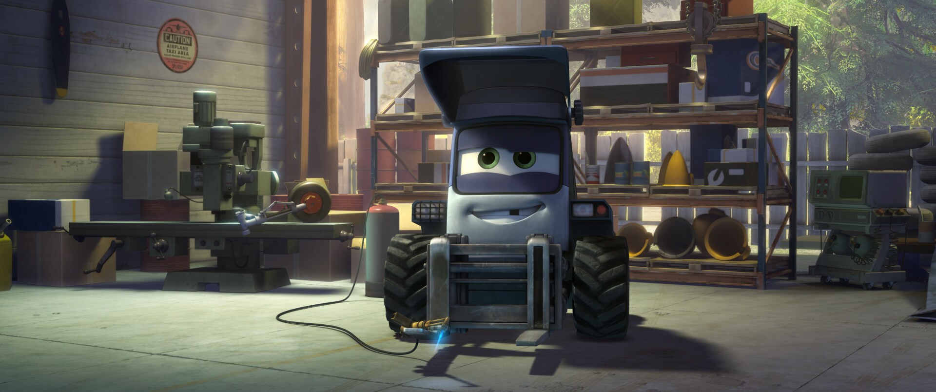 Maru (Curtis Armstrong) the mechanic tug at Piston Peak Air Attack base. From the movie "Planes: Fire & Rescue"