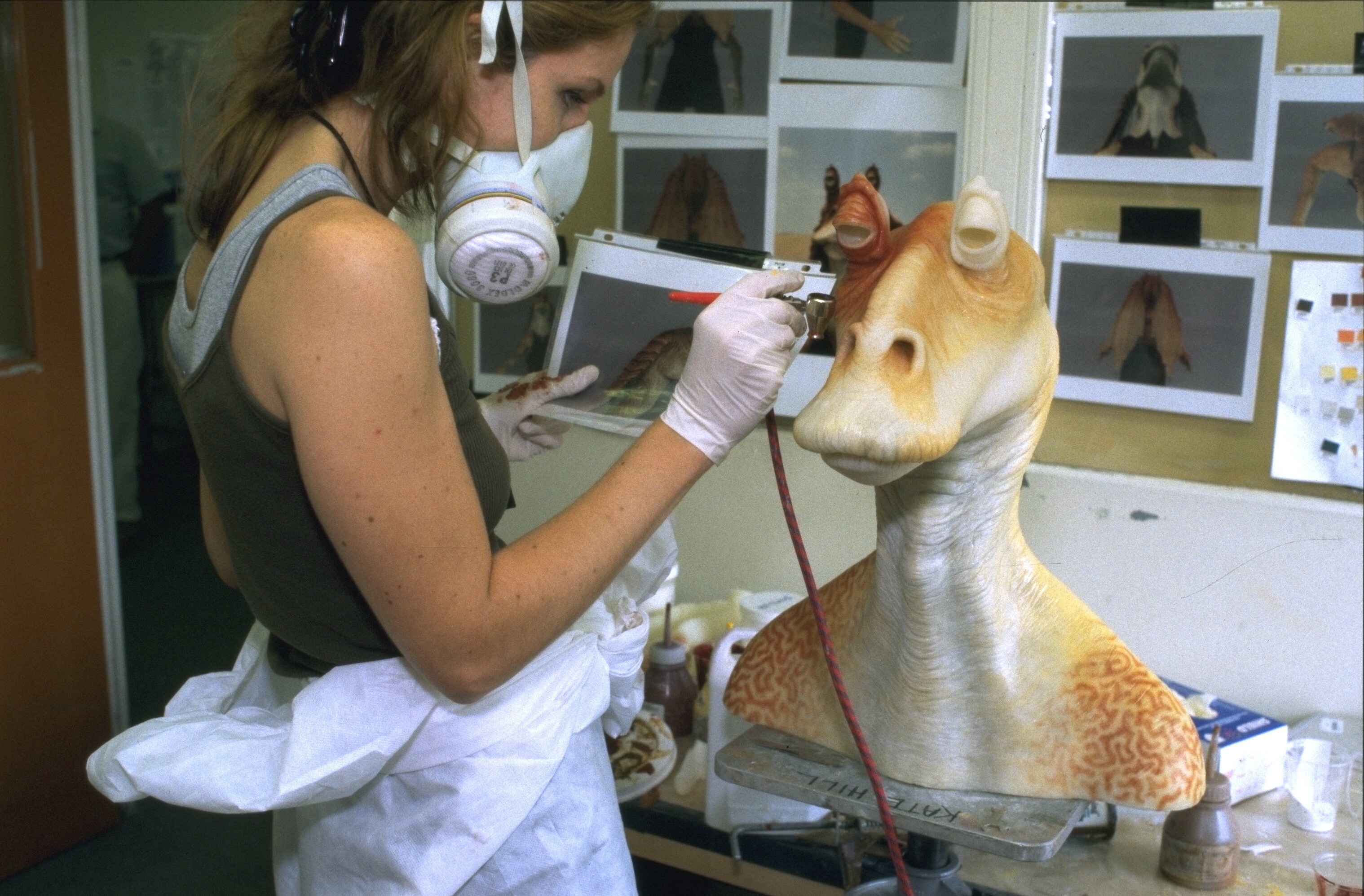 Painting a Jar Jar costume bust in the creature shop.