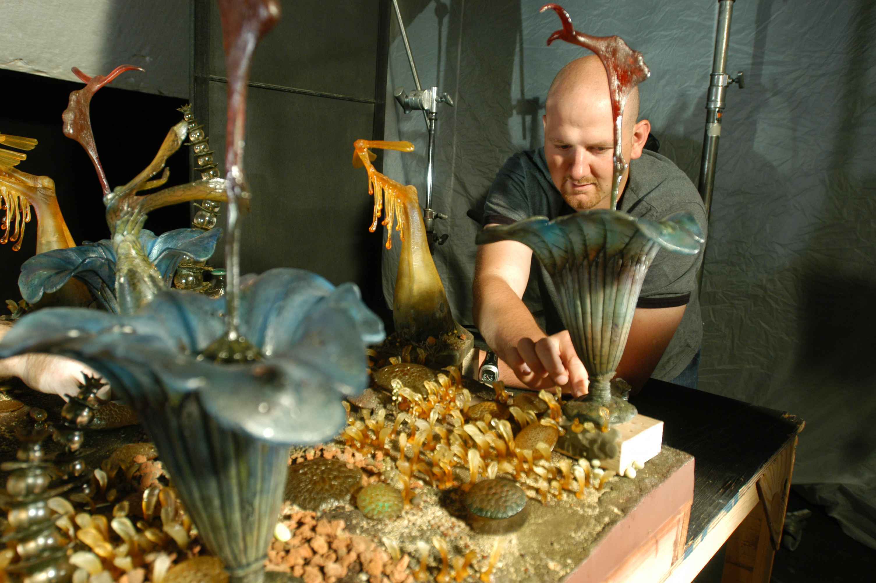 ILM visual effect art director Alex Jaeger works on the miniature Felucia set, used during the Or...