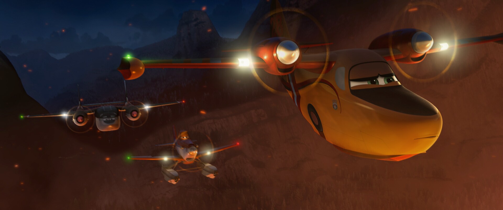 Dusty Crophopper ( Dane Cook)and friends on a night mission in the movie "Planes: Fire & Rescue"