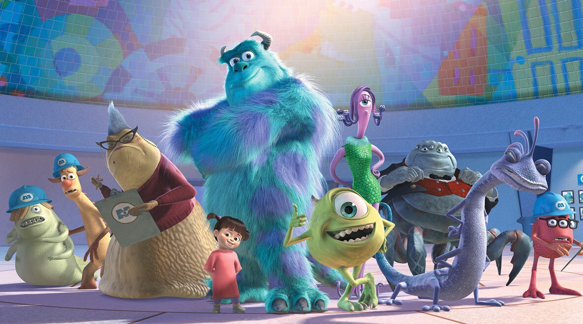 A group shot of the characters: Roz, Sully, Boo, Mike, Celia, Randall, and Mr. Waternoose in Monsters, Inc.