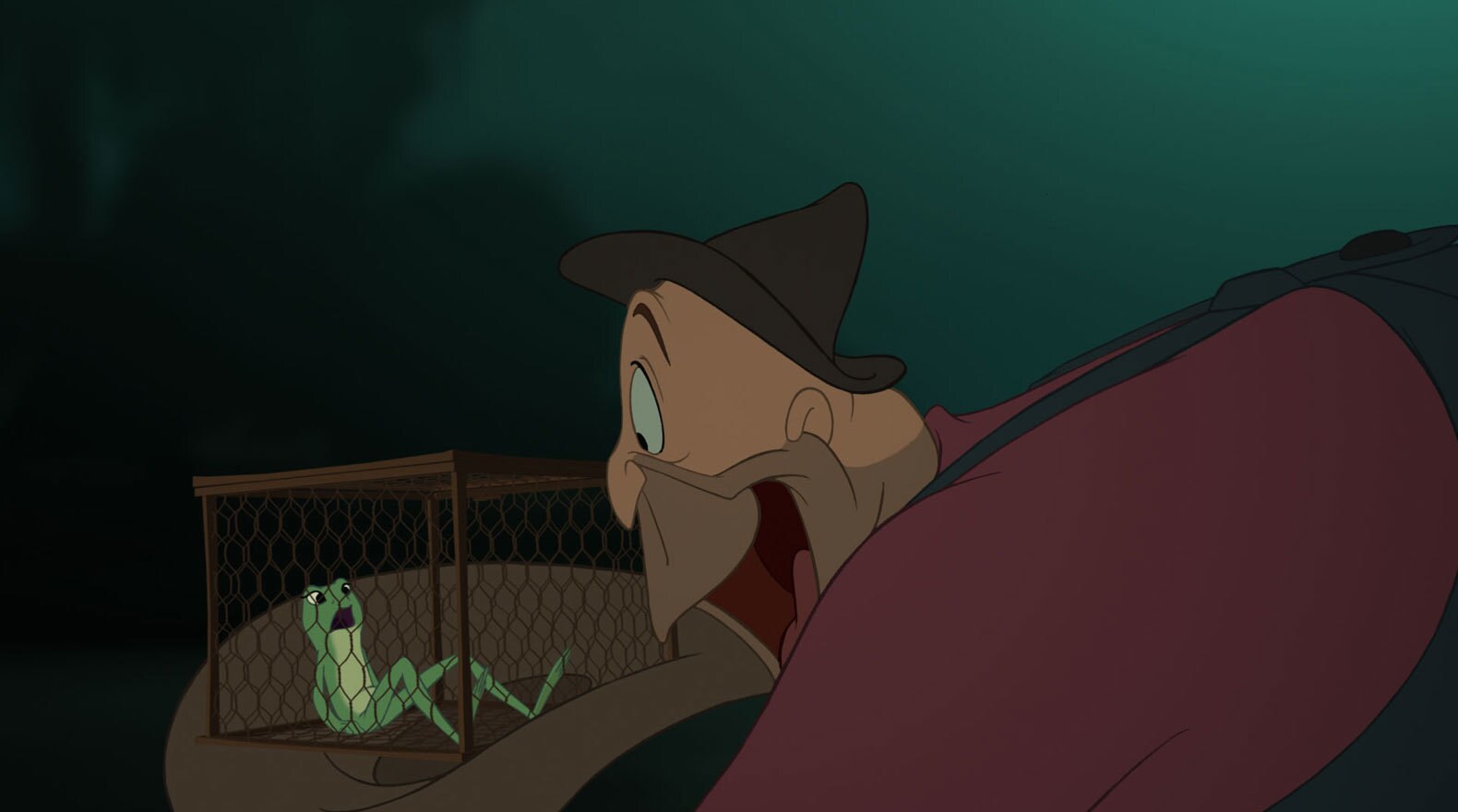 Tiana as a frog voiced by Anika Noni Rose trapped in a cage