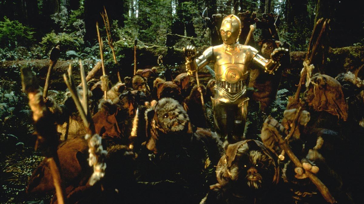 C-3PO surrounded by Ewoks 