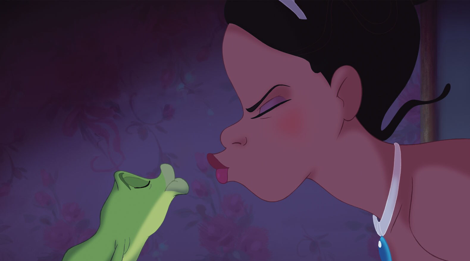 Tiana kisses Naveen as a frog in The Princess and the Frog