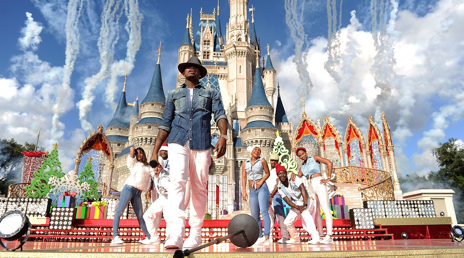 Singer Ne-Yo performs in front of Cinderella’s Castle for The Disney Parks Christmas Day Parade