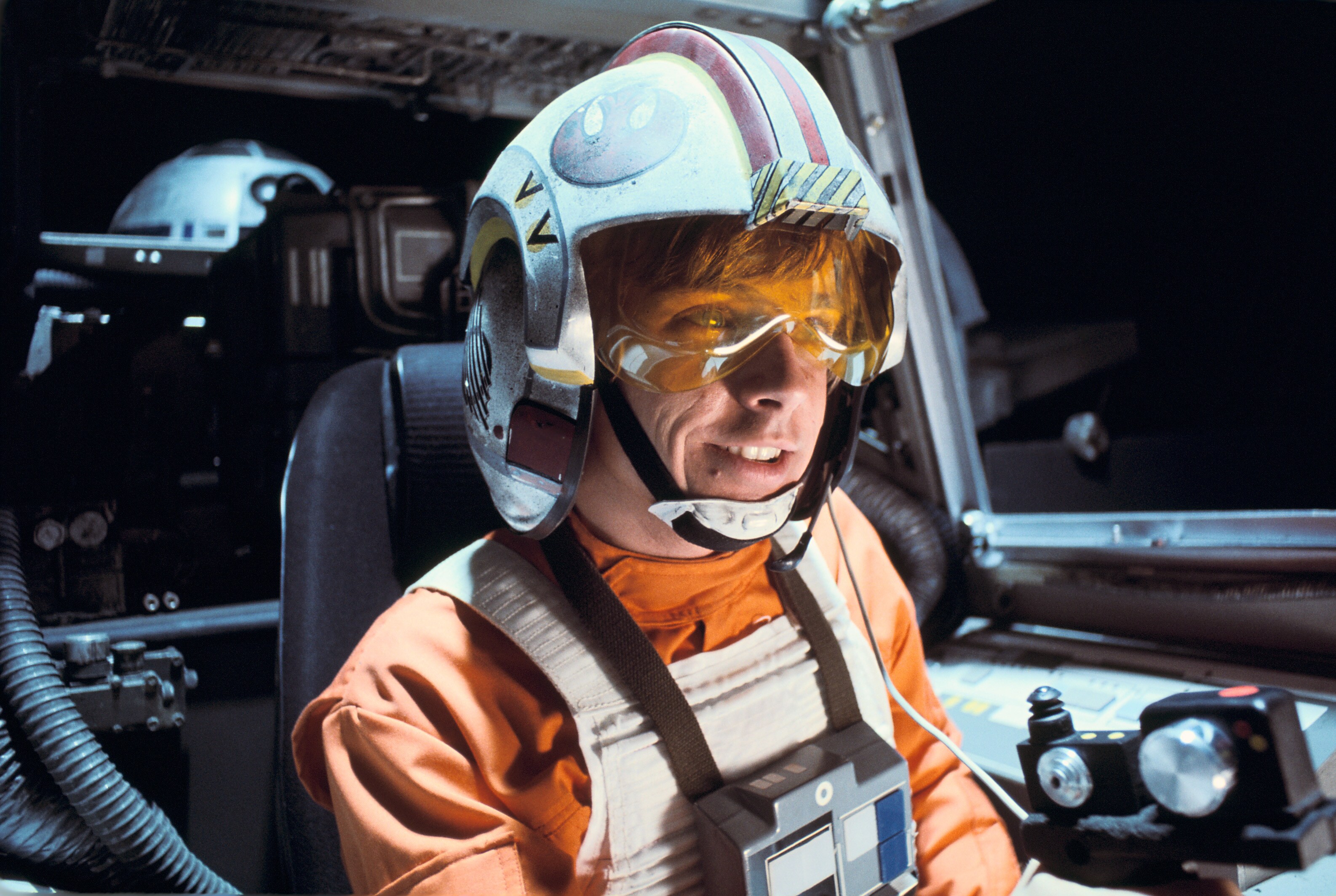 Mark Hamill in his X-wing pilot costume and cockpit, filming the climactic dogfight above the Dea...