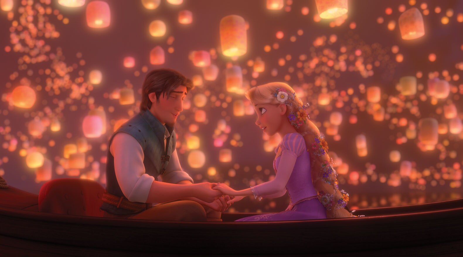 Flynn Rider and Rapunzel holding hands in a boat