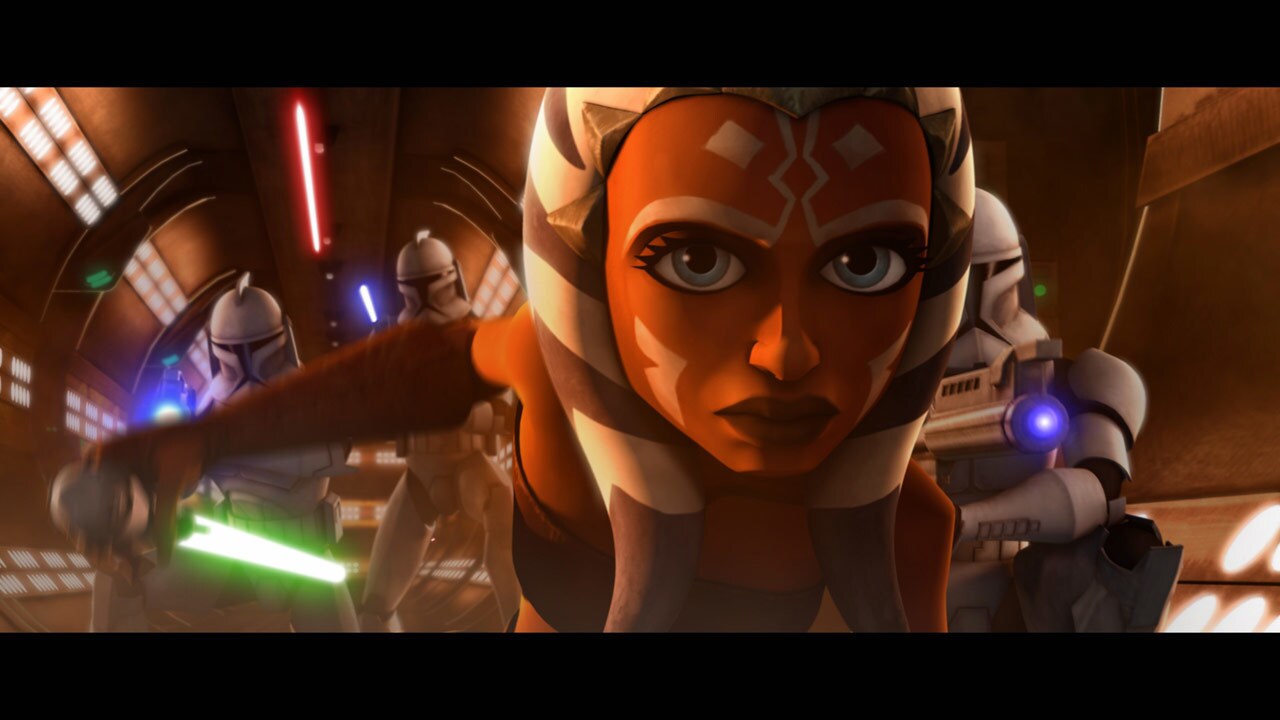 Clone troopers led by Captain Rex rappel from their gunship into the breach that Ahsoka has made....
