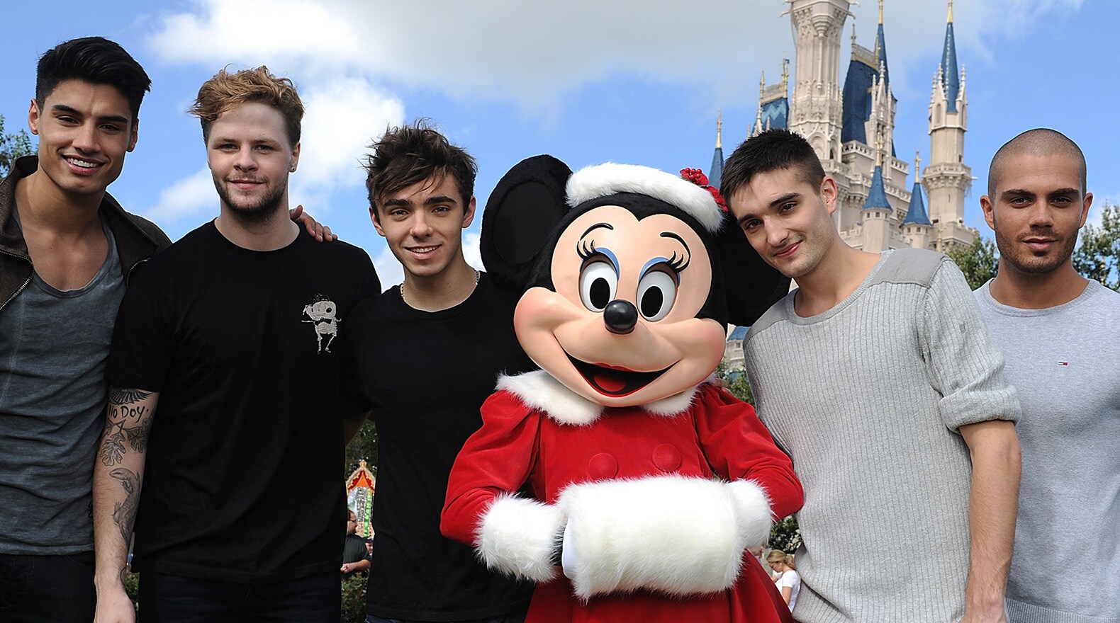 Christmas Day Parade performers, The Wanted, pose with Minnie Mouse during the taping of The Disn...