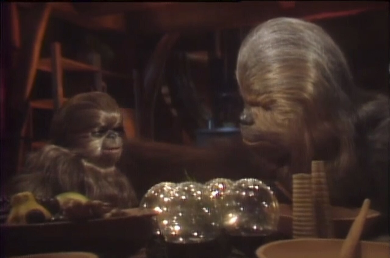 Chewbacca and son Lumpawaroo get ready for Life Day on the Star Wars Holiday Special.