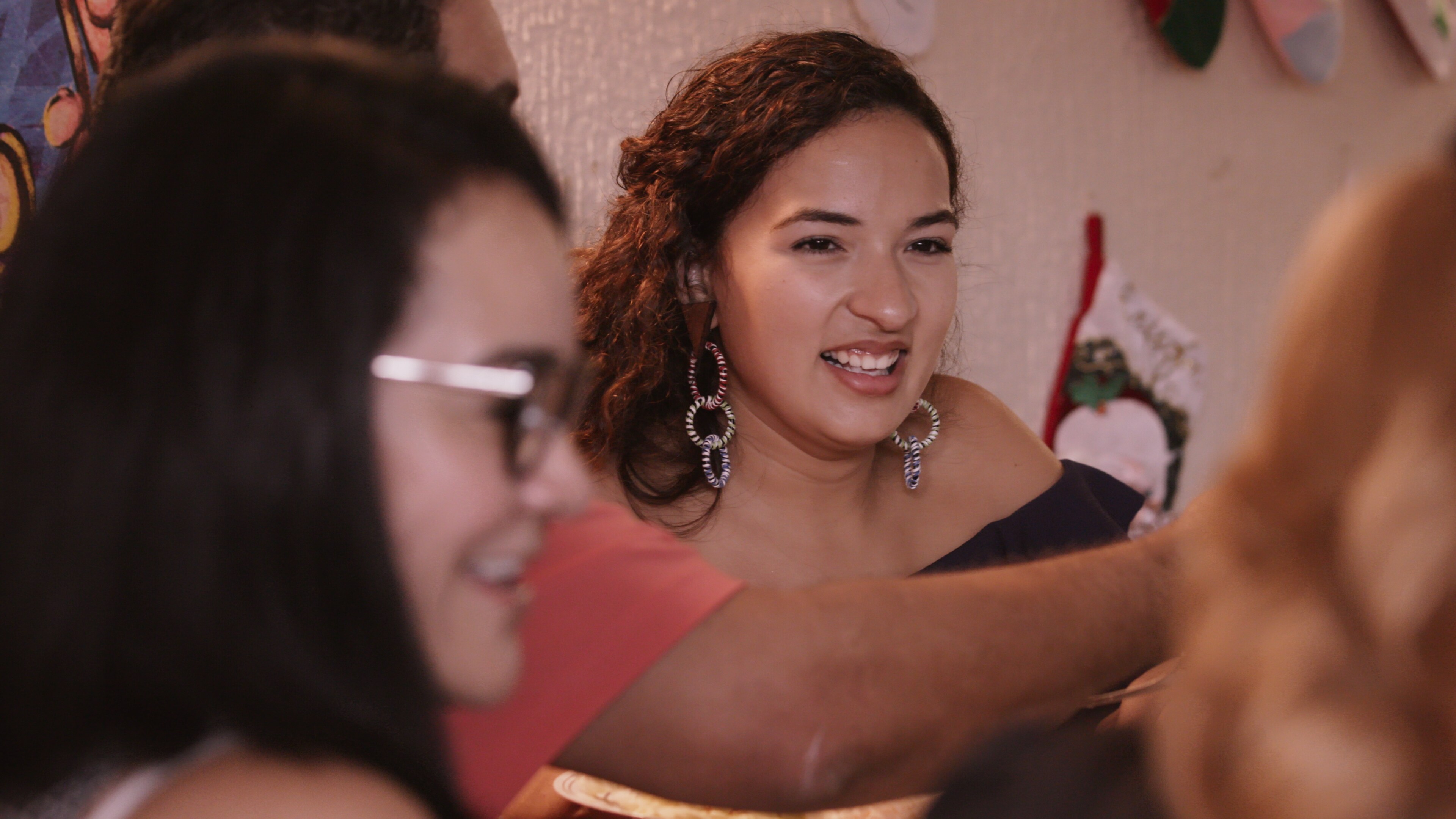 Bayamon, Puerto Rico - Alondra Toledo has dinner with her family in Puerto Rico. (Credit: Future of Work Film Inc)