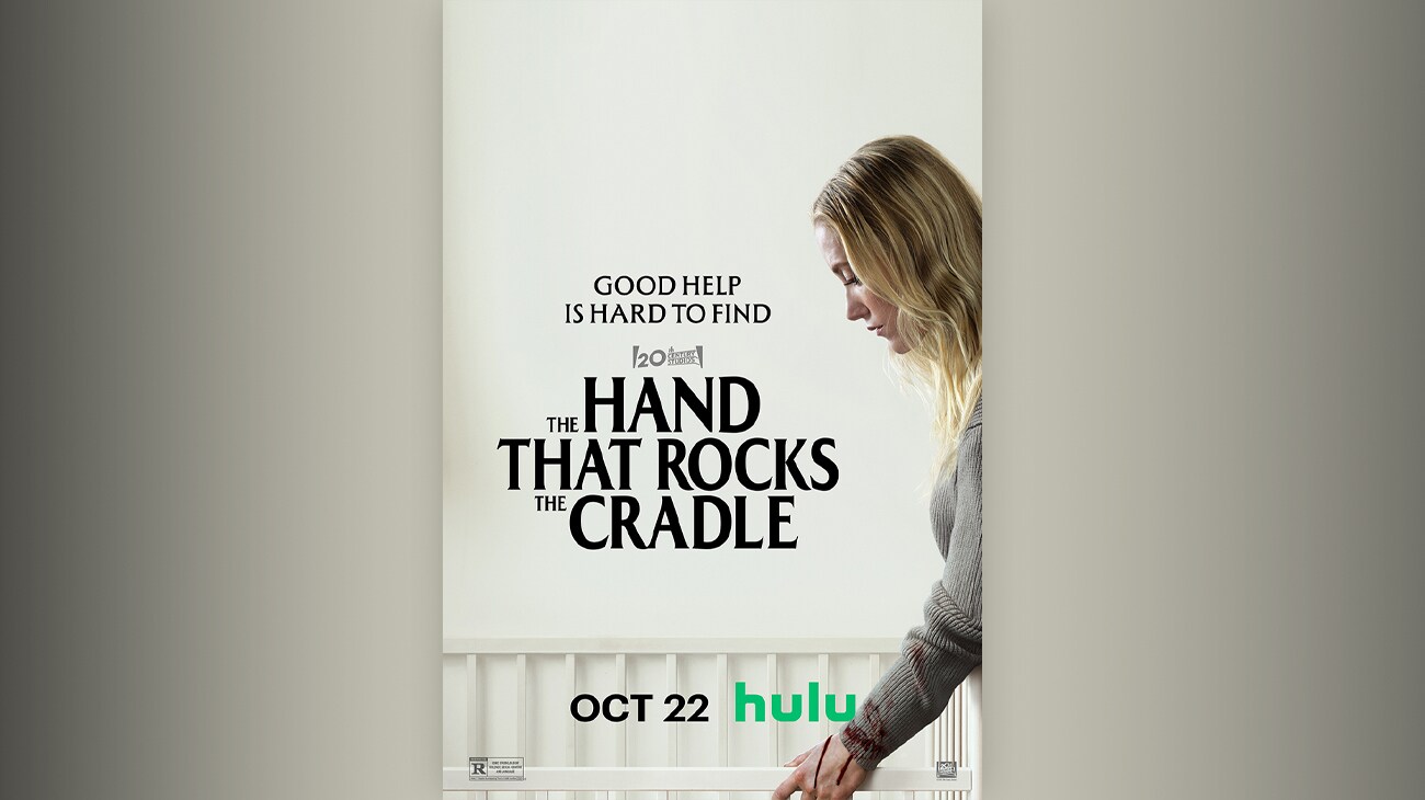Image of a side profile of woman holding the side of a crib. There is blood on her left hand. | Good help is hard to find | 20th Century Studios | The Hand That Rocks the Cradle | Oct 22 | Hulu | rated R | poster image