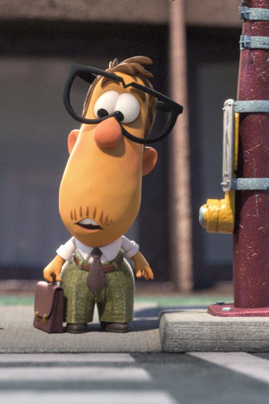 A man in large glasses standing on a curb | From the Disney Short Circuit film "Crosswalk".