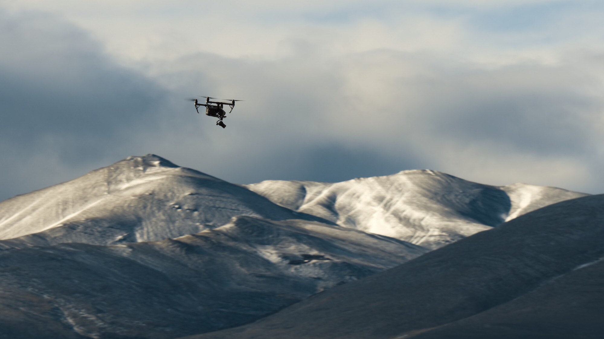 A drone flying over the mountain tops of Torres del Paine. (National Geographic for Disney+/Sam Stewart)