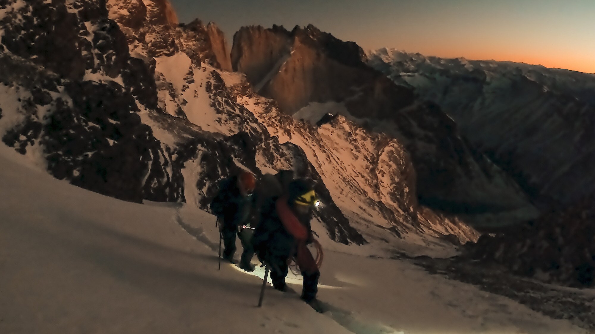 Climbers walking through snow. (National Geographic for Disney+/Bertie Gregory)