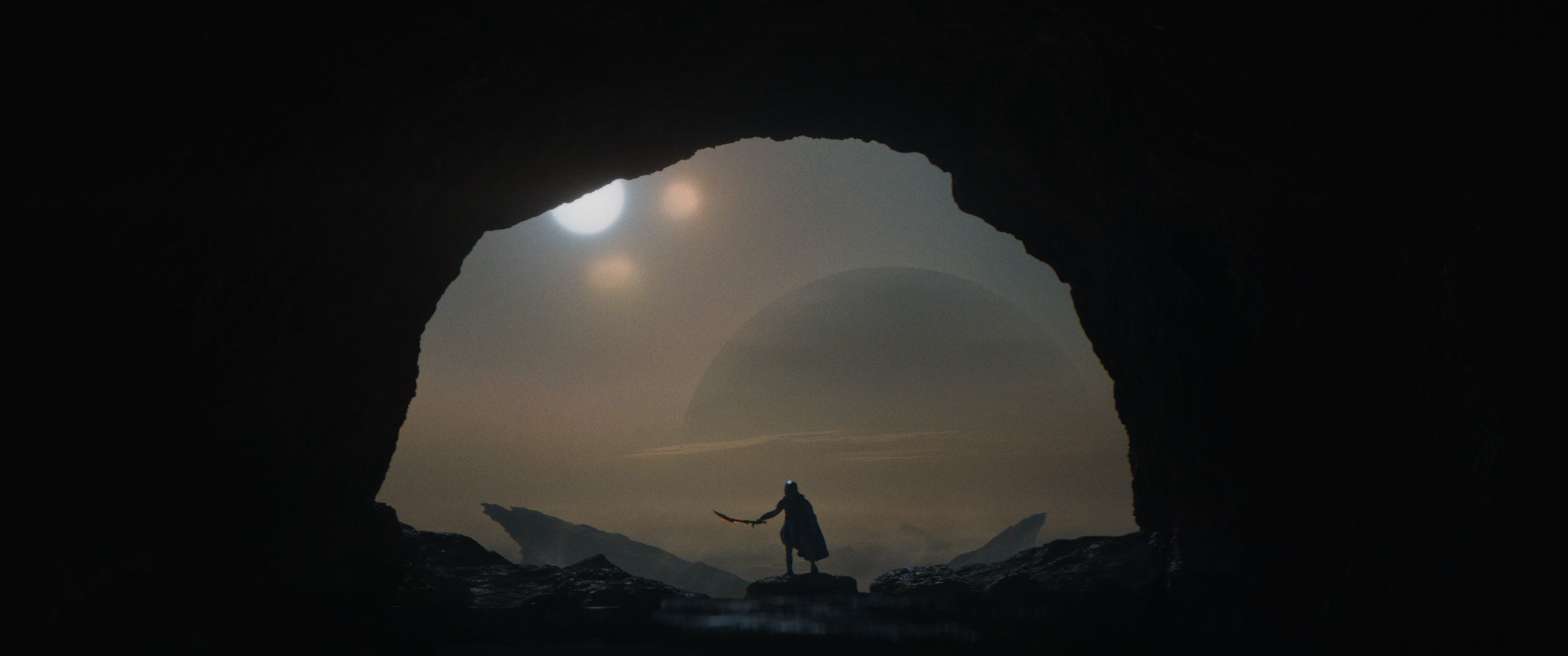 Predator: Badlands - man in cave image 