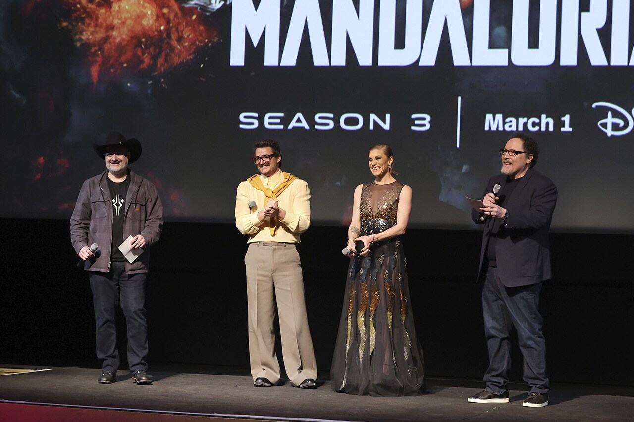 Dave Filoni, Pedro Pascal, Katee Sachoff, and Jon Favreau on stage 