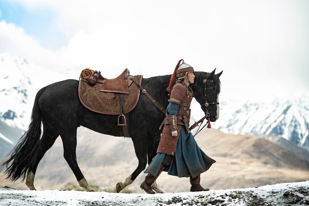 Mulan walking with horse