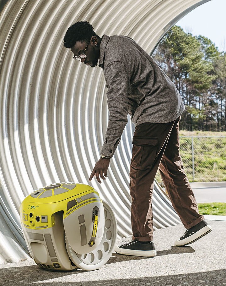 Lifestyle images of Star Wars Cargo-Carrying Robot from Piaggio.