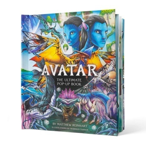 Image of the front cover of the Avatar: The Ultimate Pop-Up Book by Matthew Reinhart with illustrations by Rodrigo Tannus that features colored images of several Na'vi, a banshee, a titanothere hammerhead and several other creatures.